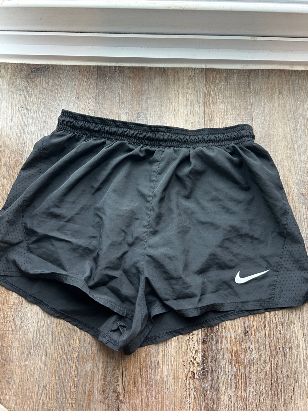 Nike Women's Black Athletic Running Shorts with White Swoosh